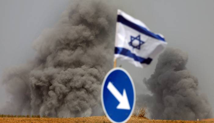 Humo sobre el norte de la Franja de Gaza luego de un ataque israelí, en medio de las batallas entre Israel y el grupo palestino Hamas en la ciudad de Sderot, en el sur de Israel, el 23 de octubre de 2023. · Foto: Thomas Coex, AFP