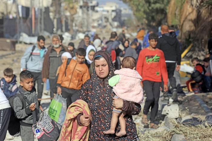 Palestinos escapan de los combates en Gaza, en Zeitoun en la parte sur de la Franja de Gaza (19.11.2023). · Foto: Mahmud Hams,  AFP