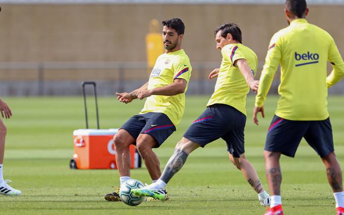 Luis Suárez y Lionel Messi, durante el entrenamiento del Barcelona, el 25 de mayo.
Foto: Miguel Ruiz, EFE, Fc Barcelona 