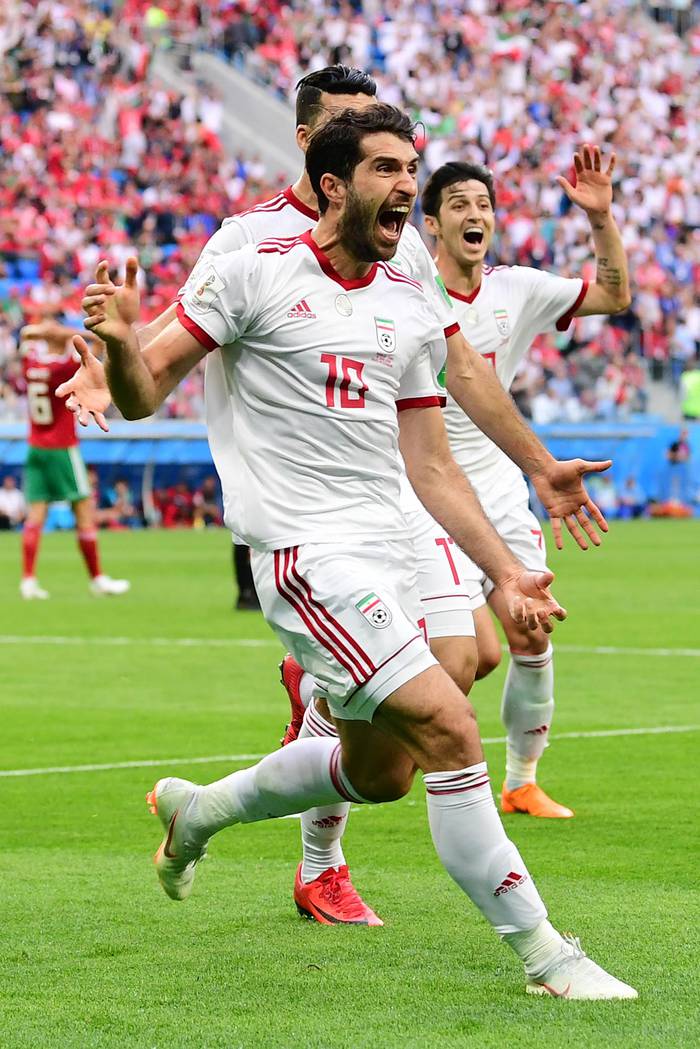 Los jugadores iraníes celebran después de que Marruecos marcó un gol en el partido de fútbol del Grupo B de la Copa Mundial Rusia 2018 entre Marruecos e Irán en el Estadio de San Petersburgo en San Petersburgo el 15 de junio de 2018.
Giuseppe CACACE / AF