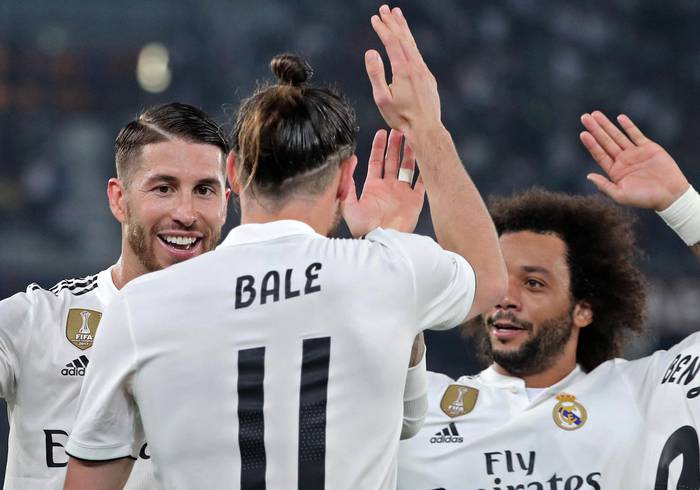 Gareth Bale (centro) festeja su gol durante la semifinal de la Copa Mundial de Clubes de la FIFA ante Kashima Antlers. · Foto: Karim Sahib, AFP