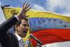El presidente de la Asamblea Nacional de Venezuela, Juan Guaido, durante un acto en el que se declaró a sí mismo como "presidente interino", ayer, en Caracas. · Foto: Federico Parra El presidente de la Asamblea Nacional de Venezuela, Juan Guaido, durante un acto en el que se declaró a sí mismo como "presidente interino", ayer, en Caracas. · Foto: Federico Parra