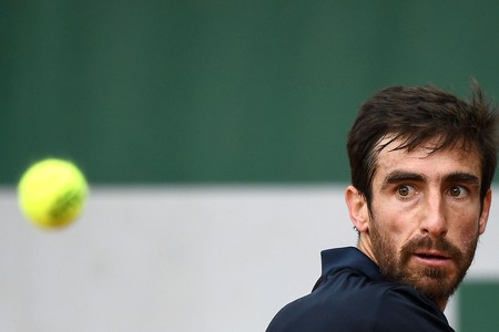 Pablo Cuevas durante el partido ante el británico Kyle Edmund, en la segunda ronda de individuales del Roland Garros 2019 French Open, en París (archivo, mayo 2019)
· Foto: Anne-Christine Poujoulat / AFP Pablo Cuevas durante el partido ante el británico Kyle Edmund, en la segunda ronda de individuales del Roland Garros 2019 French Open, en París (archivo, mayo 2019)
· Foto: Anne-Christine Poujoulat / AFP