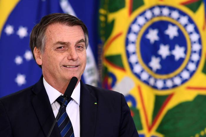El presidente brasileño Jair Bolsonaro brinda un discurso en el Palacio de Planalto. · Foto: Evaristo Sa, AFP