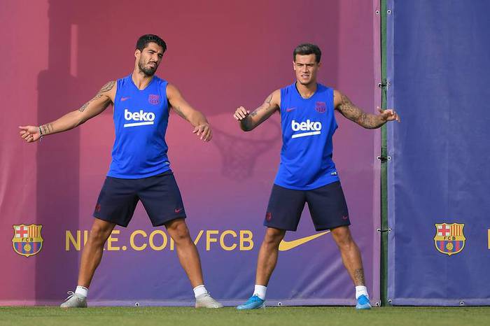 Luis Suárez, y Philippe Coutinho, en el centro de entrenamiento Joan Gamper de Barcelona (archivo, agosto de 2019). · Foto: Lluis Gene, AFP