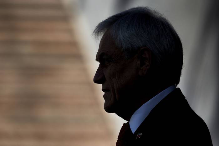 Sebastián Piñera, durante la firma de un acuerdo, en el palacio de La Moneda, el 6 de octubre, en Santiago. · Foto: Javier Torres, AFP