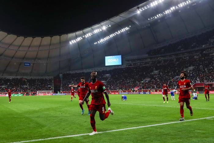 Los jugadores del Liverpool celebran su gol ganador durante la semifinal de la Copa Mundial de Clubes de la FIFA 2019 entre el Monterrey mexicano y el Liverpool de Inglaterra, en el Estadio Internacional Khalifa, en la capital de Qatar, Doha, el 18 de diciembre de 2019. Karim Jaafar / AFP