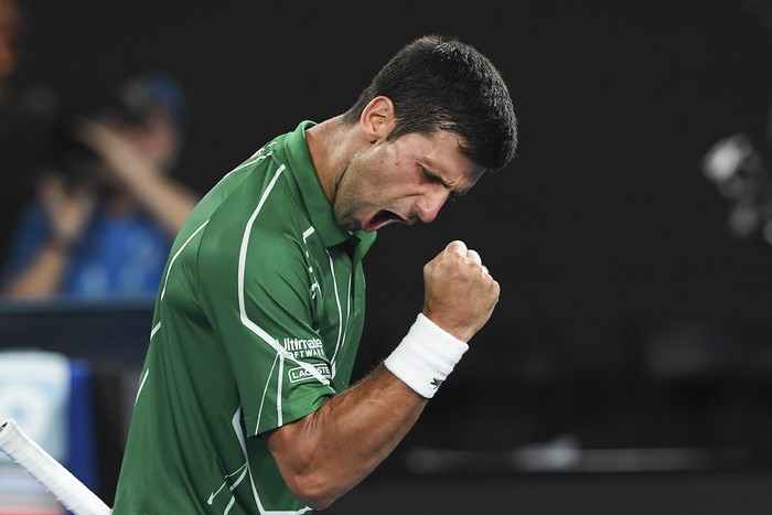 Novak Djokovic celebra su victoria ante Roger Federer durante la semi final masculina en singles ,en el  abierto de Australia, el 30 de enero el 2020.
 · Foto: Greg Wood