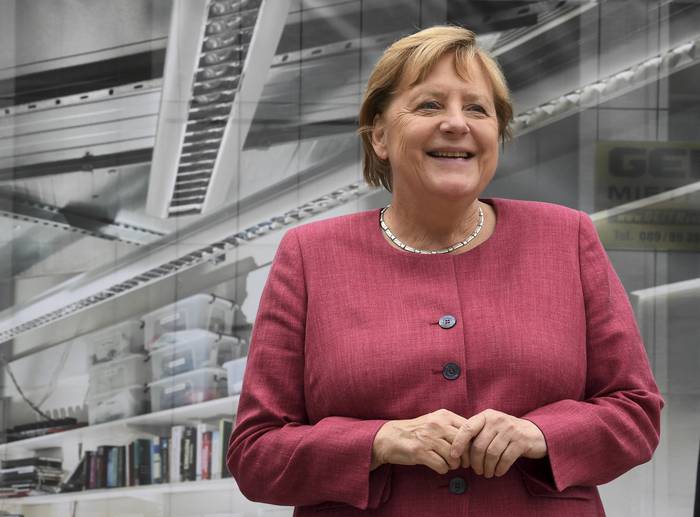 La canciller alemana, Angela Merkel durante una visita al Instituto Max Planck de Óptica Cuántica, en Garching, cerca de Múnich, en el sur de Alemania, el miércoles. · Foto: Christof Stache, AFP