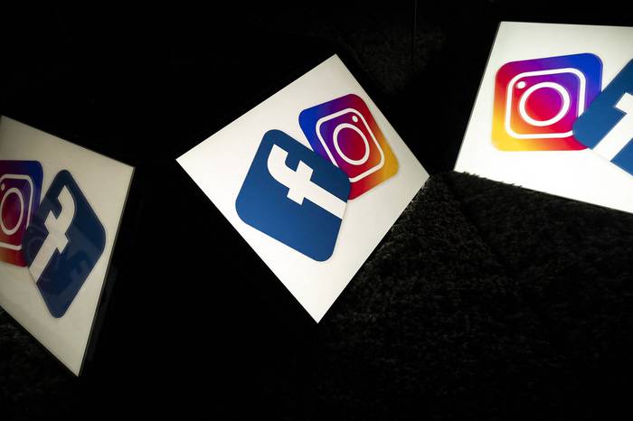 Logotipos de las redes sociales estadounidenses Facebook e Instagram. Foto: Lionel Bonaventure, AFP