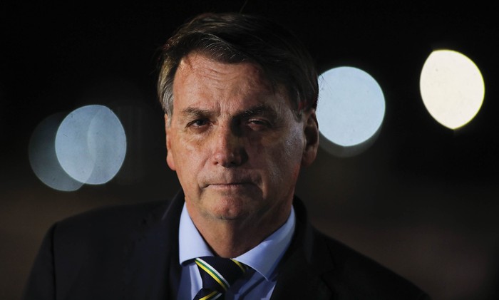 Jair Bolsonaro, durante una conferencia de prensa en el Palacio da Alvorada, en Brasilia, el 16 de abril. · Foto: Sergio Lima, AFP