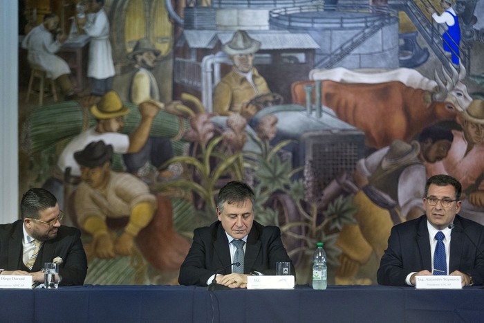 Diego Durand, Omar Paganini y Alejandro Stipanicic, durante la asuncion de las autoridades de ANCAP. · Foto: .