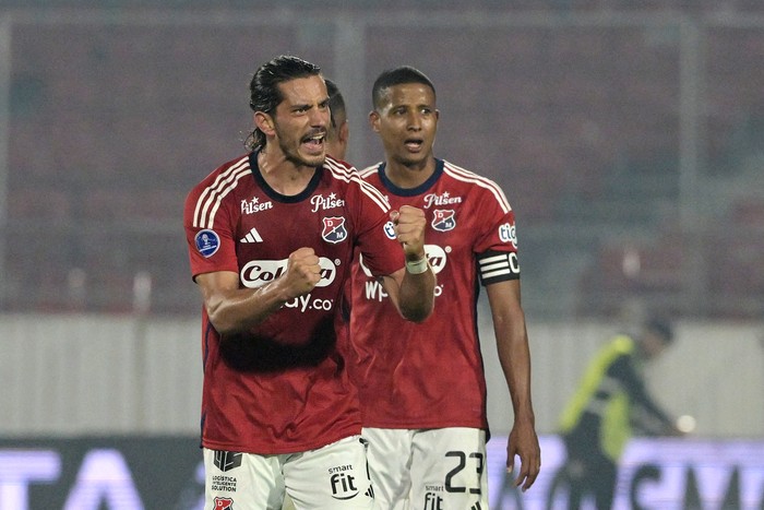 Joaquín Varela, de Independiente de Medellín tras convertir el segundo gol de su equipo frente a Palestina, el 15 de agosto, en el Estadio Nacional de Santiago. · Foto: Rodrigo Arangua, AFP