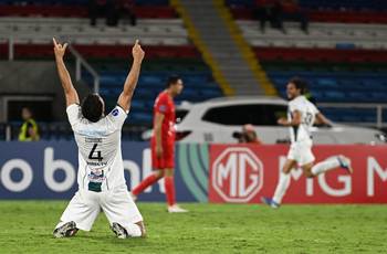 Guillermo Cotugno celebra el gol de Racing ante América de Cali, el 27 de mayo, en el estadio Olímpico Pascual Guerrero en Cali, Colombia. · Foto: Joaquín Sarmiento, AFP