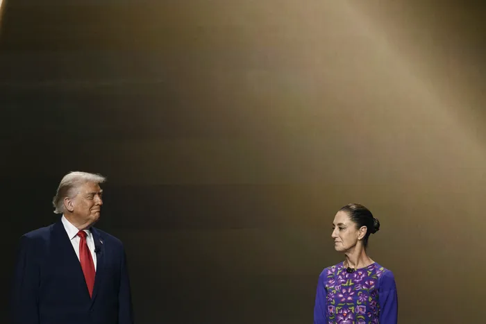 Donald Trump y Claudia Sheinbaum, en Washington DC. (archivo, diciembre de 2025). · Foto: Brendan Smialowski, AFP