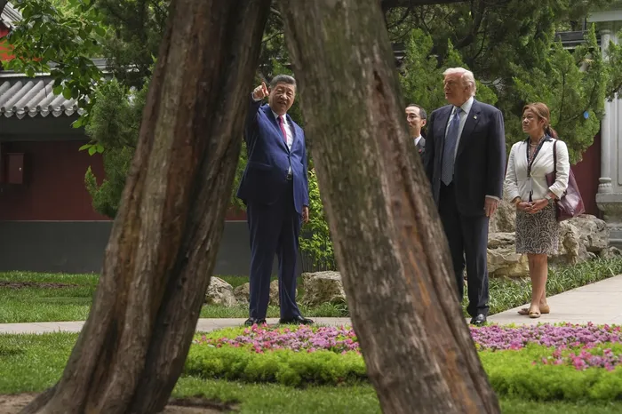 Los presidentes, Xi Jinping, de China, y Donald Trump, de Estados Unidos, el 15 de mayo de 2026 en Beijing. · Foto: Mark Schiefelbein, pool, AFP
