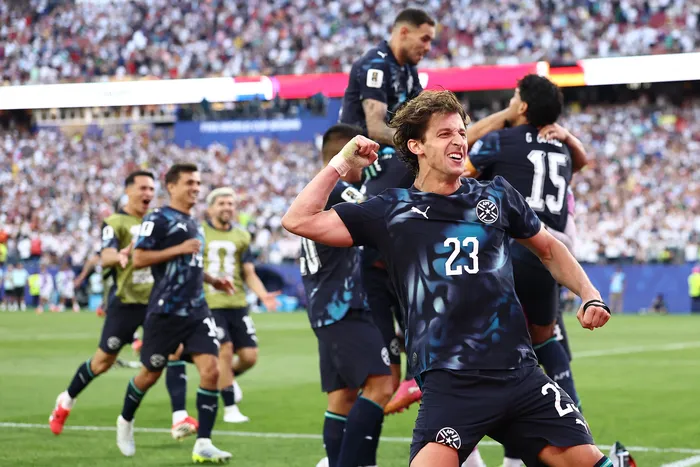 Jugadores de Paraguay festejan tras ganarle a Alemania, el 29 de junio, en Boston. · Foto: Charly Triballeau, AFP