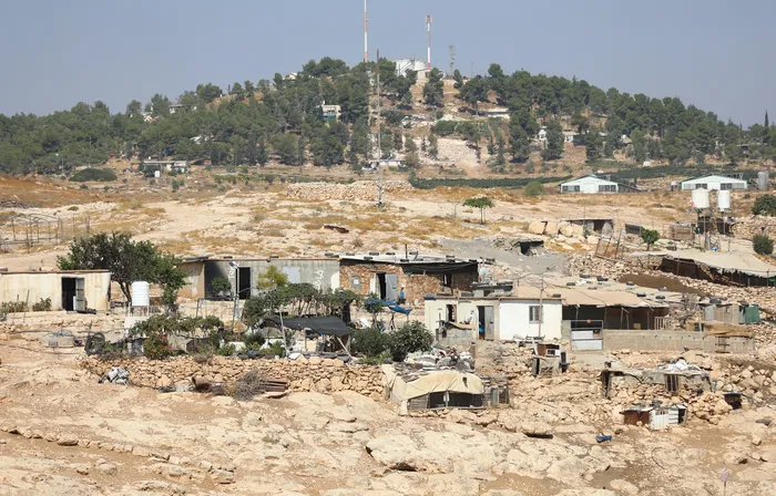 Comunidad de Khirbet al-Tuba, en la zona de Masafer Yatta, al sur de Hebrón (Cisjordania, Palestina), el 6 de agosto, tras un ataque perpetrado por colonos israelíes. 
Foto: Wisam Hashlamoun, Anadolu, AFP