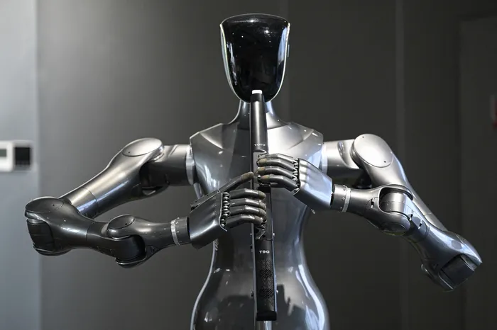 Robot toca la flauta, en la Universidad de Zhejiang, en China. · Foto: Jade Gao, AFP