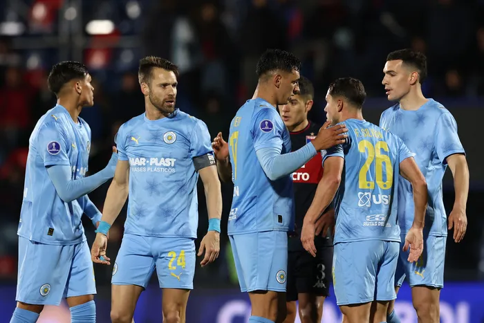 Jugadores de Torque al final del partido frente a Tigre, el 12 de agosto, en Buenos Aires. · Foto: Rodrigo Buendía, AFP