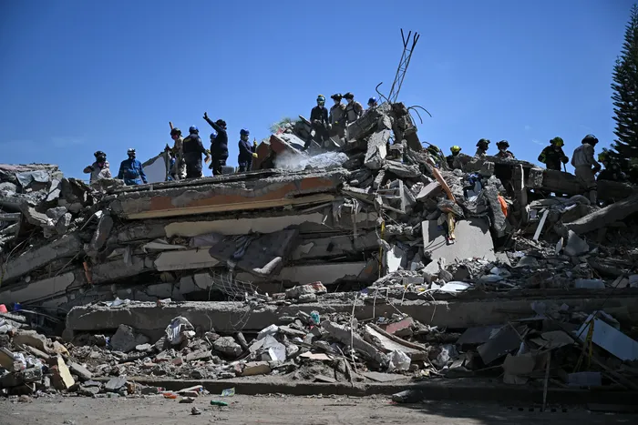 Tareas de rescate, el 13 de agosto, en Cali. · Foto: Raúl Arboleda, AFP
