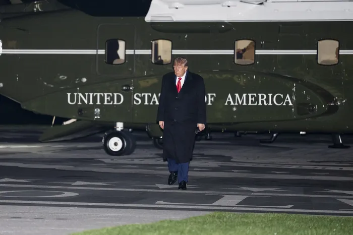 Donald Trump llega a la Casa Blanca desde Iowa donde viajó para apoyar a sus candidatos para las elecciones de medio término. · Foto: Aaron Schwartz, Getty Images, AFP