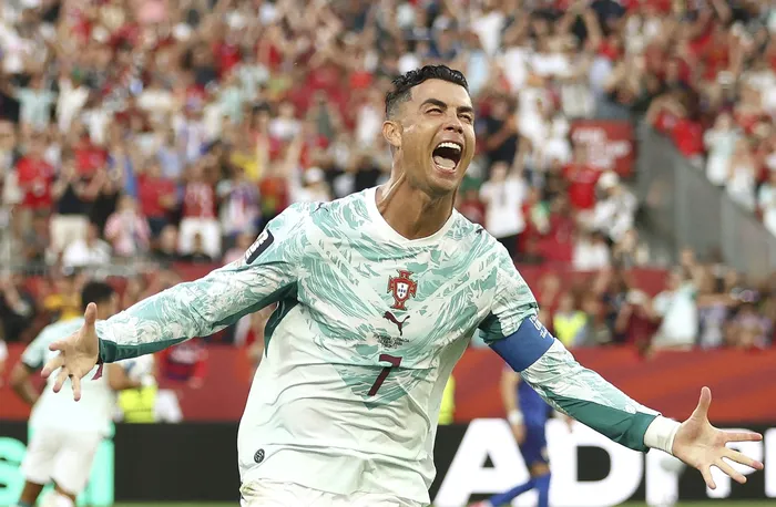 Cristiano Ronaldo, de Portugal, el 2 de junio, celebrando el tanto del empate contra Croacia en el BMO Field de Toronto. · Foto: Cole Burston, AFP