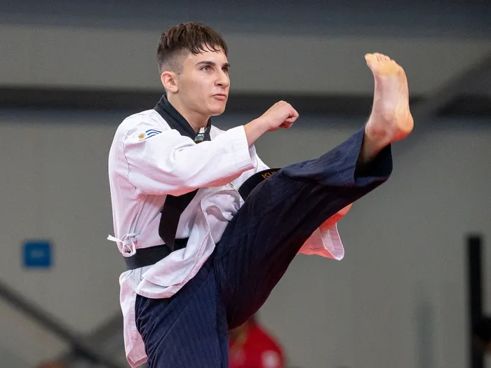John Cerrato, el 21 de abril, durante la competencia de taekwondo, en Panamá. Foto: Udesur