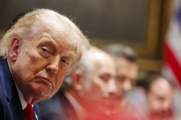 Donald Trump durante una reunión de gabinete en la Casa Blanca, el 27 de mayo. · Foto: Win McNamee, AFP