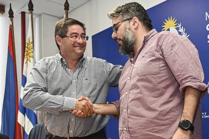 Leonardo Cipriani y Martín Pereira, en el Ministerio de Trabajo y Seguridad Social (19.12.2022). · Foto: ASSE