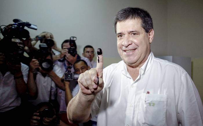 Horacio Cartes, después de votar durante las elecciones primarias en Asunción (archivo, diciembre de 2017). · Foto: Favio Falcón, AFP