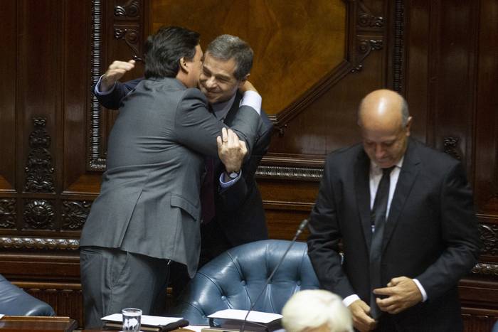 Adrián Peña, Ernesto Talvi y Germán Coutinho, durante la asunción de la nueva legislatura, el 15 de febrero de 2020, en la Cámara de Senadores.