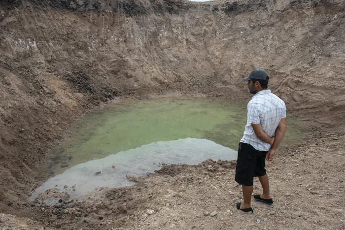 Tajamar en Tala, durante la sequía agropecuaria, en Canelones, Uruguay (archivo, febrero de 2023). · Foto: Alessandro Maradei