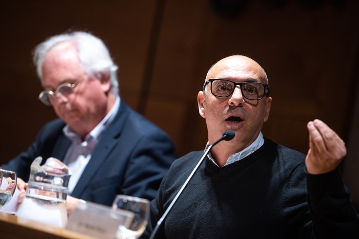 Rodolfo Saldain y Marcelo Abdala, el 6 de agosto, en la Universidad Católica. · Foto: Gianni Schiaffarino