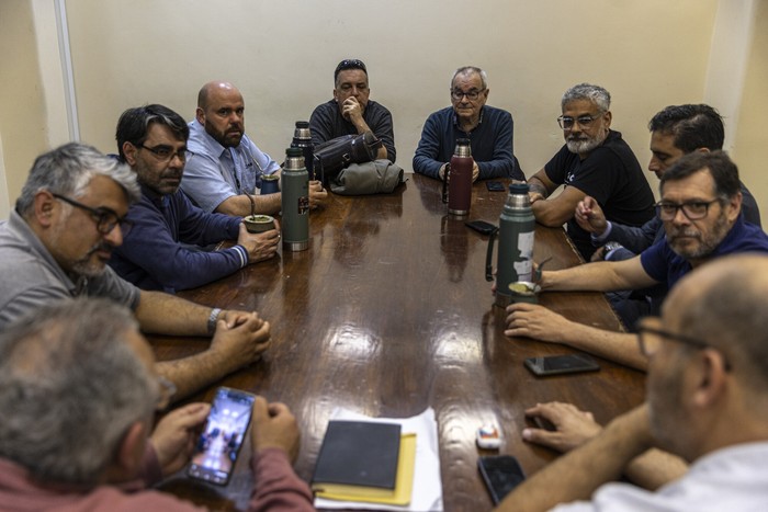 Representantes de COPSA y de UNNOT, el 14 de octubre en el Ministerio de Trabajo. · Foto: Ernesto Ryan