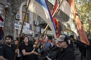 Militantes frente a la sede del Movimiento de Liberación Nacional- Tupamaros.