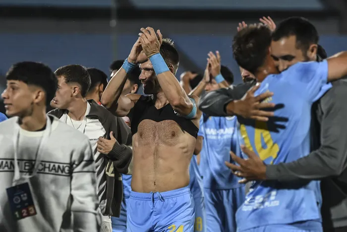 Jugadores de Torque, en el estadio Centenario. · Foto: Inés Guimaraens