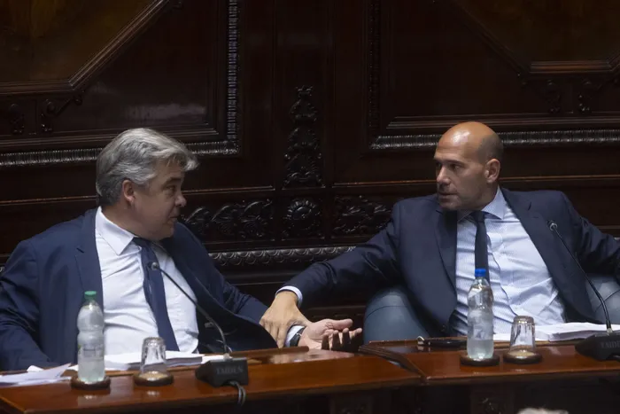 Carlos Camy y Martín Lema, en el Senado. · Foto: Ernesto Ryan