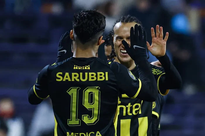 Matías Arezo y Diego Laxalt, de Peñarol, en el estadio Luis Franzini. · Foto: Ernesto Ryan