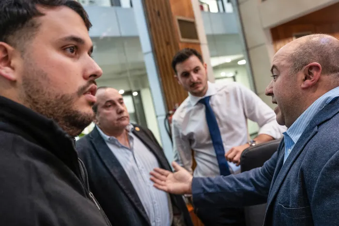 Federico Paganini, Guillermo Kruse, Joaquín Campos y Rafael Seijas, el 4 de junio, en la Junta Departamental de Montevideo. · Foto: Inés Guimaraens