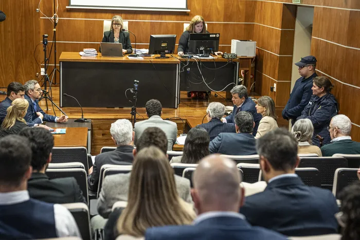 Pablo Carrasco y Ana Iewdiukow, durante la audiencia de Conexión ganadera en el juzgado de Juan Carlos Gomez, el 5 de agosto · Foto: Ernesto Ryan