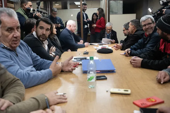 En la firma del convenio en el Ministerio de Trabajo y Seguridad Social, el 14 de agosto, en Montevideo. · Foto: Alessandro Maradei