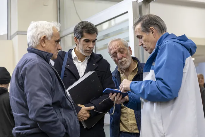 Jorge Pozzi, Alberto Baroffio, Mario Barros y Carlos Muñoa, el 8 de setiembre, durante la tripartita en el Ministerio de Trabajo. · Foto: Rodrigo Viera Amaral