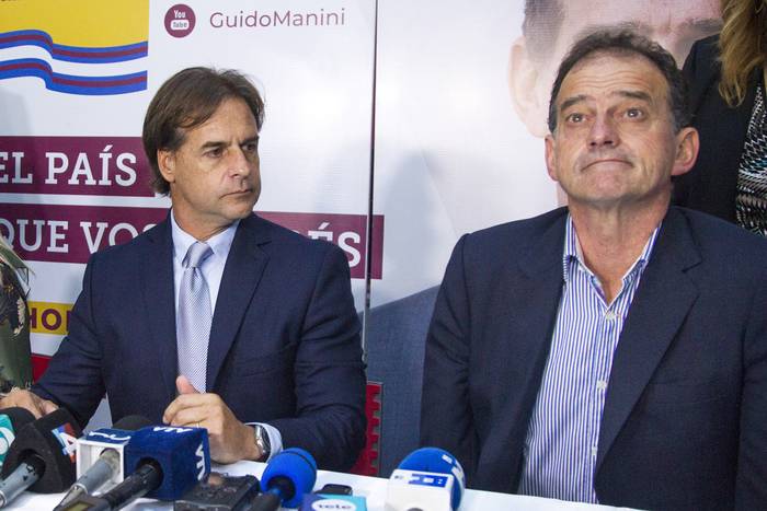 Luis Lacalle Pou y Guido Manini Rios, en la sede de Cabildo Abierto, durante campaña electoral (archivo, octubre de 2019) · Foto: Ernesto Ryan