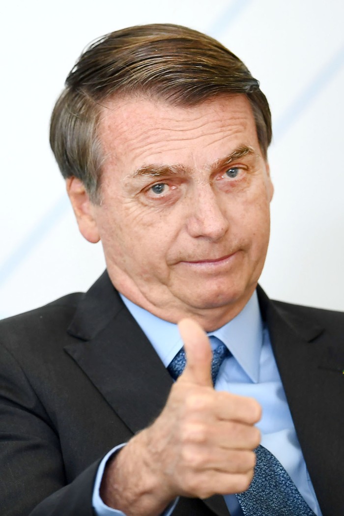 Jair Bolsonaro, durante la celebración del Día Internacional de la Juventud en el Palacio Planalto, en Brasilia, el 16 de agosto. 
 · Foto: Evaristo Sa, AFP