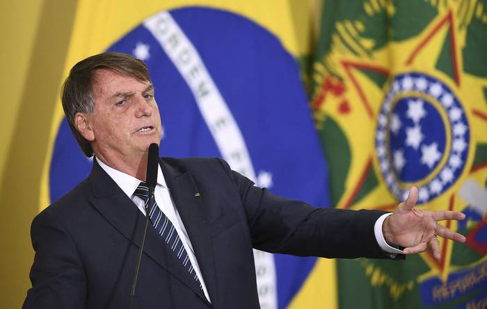 Jair Bolsonaro en el Palácio do Planalto, en Brasilia, el 25 de marzo. · Foto: Evaristo Sa, AFP