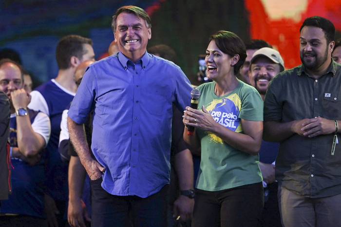 Jair Bolsonaro, y la primera dama, Michelle Bolsonaro, durante el evento de la Marcha por Jesucristo, el sábado, en Río de Janeiro. · Foto: Mauro Pimentel, AFP