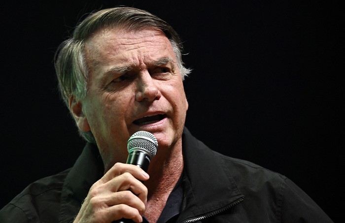 Jair Bolsonaro habla durante la primera edición del Seminario de Comunicación del Partido Liberal, este jueves, en Brasilia. · Foto: Evaristo Sa, AFP