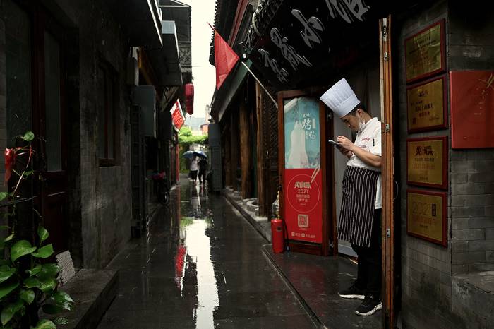 Callejón cerca de la calle Qianmen, en Pekín, el 18 de agosto. · Foto: Noel Celis, AFP