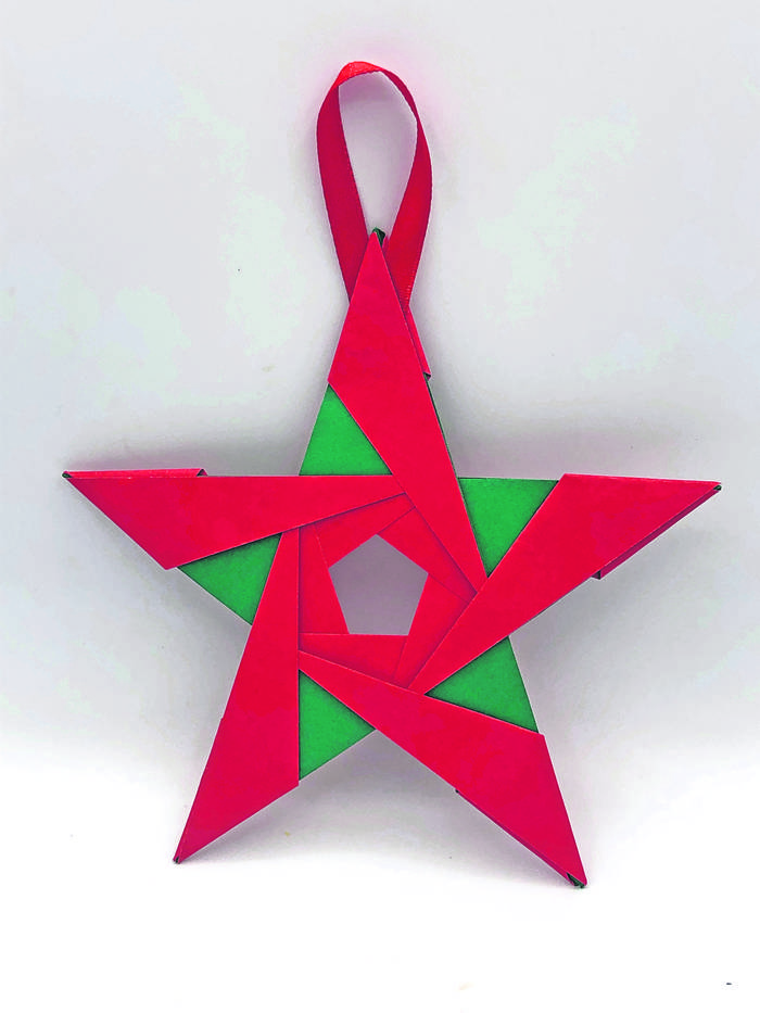 Foto principal del artículo 'Chirimbolos plegados: Museo del Origami de Colonia alienta a armar un árbol navideño colaborativo'